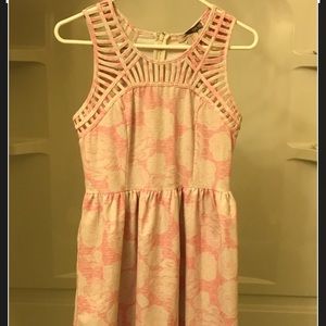 Sleeveless pink and white dress w/detailed bodice